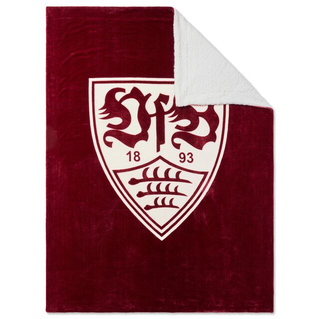rote Sherpadecke mit umgeschlagener Ecke und weißer Rückseite