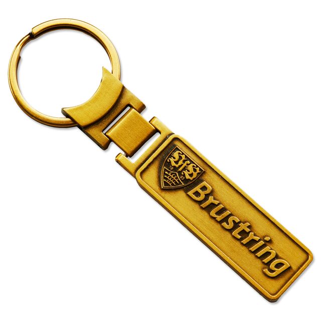 goldener Schlüsselanhänger mit VfB Wappen und der Aufschrift Brustring