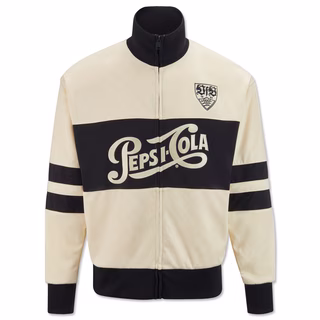 Beige Jacke mit schwarzen Akzenten, Schriftzug Pepsi Cola in der Mitte und schwarzem VfB Wappen auf der Brust 
