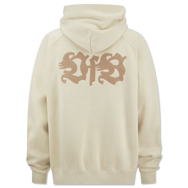 beigefarbene Rückseite des Hoodies mit großem beigefarbenen VfB Schriftzug