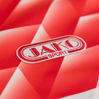 Nahaufnahme des JAKO Retro Logos auf dem Trikot