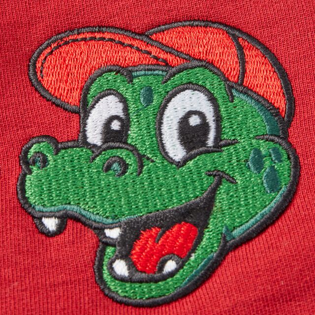 Nahaufnahme von Fritzles Gesicht auf dem VfB Baby Sweater Fritzle