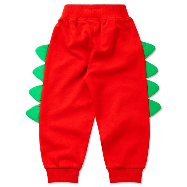 rote Rückseite der Hose mit grünen Krokodilschuppen an der Seite